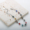 Bracelet charm en cristal arc-en-ciel