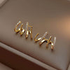 Boucles d'oreilles Illusion avec Quatre Anneaux & Zirconium - Zarvia