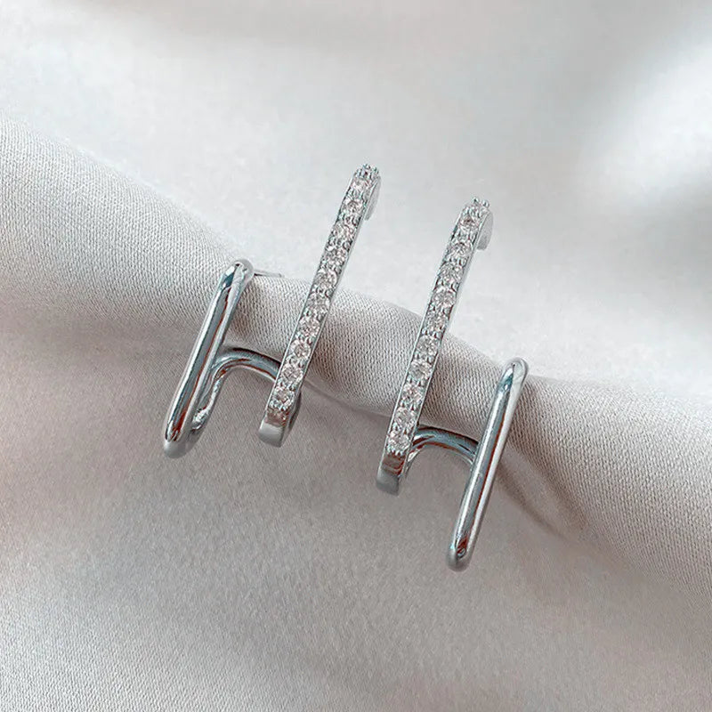 Boucles d'oreilles en forme de griffes en cristal