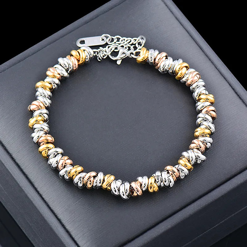 Bracelet chaîne perles dorées