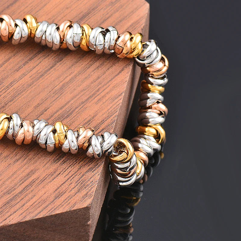Bracelet chaîne perles dorées