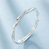 Bracelet en Argent Torsadé - Design Élégant et Ajustable