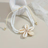 Bracelet de Cheville Bohémien avec Fleur en Coquillage - Accessoire Élégant pour l'Été et les Vacances