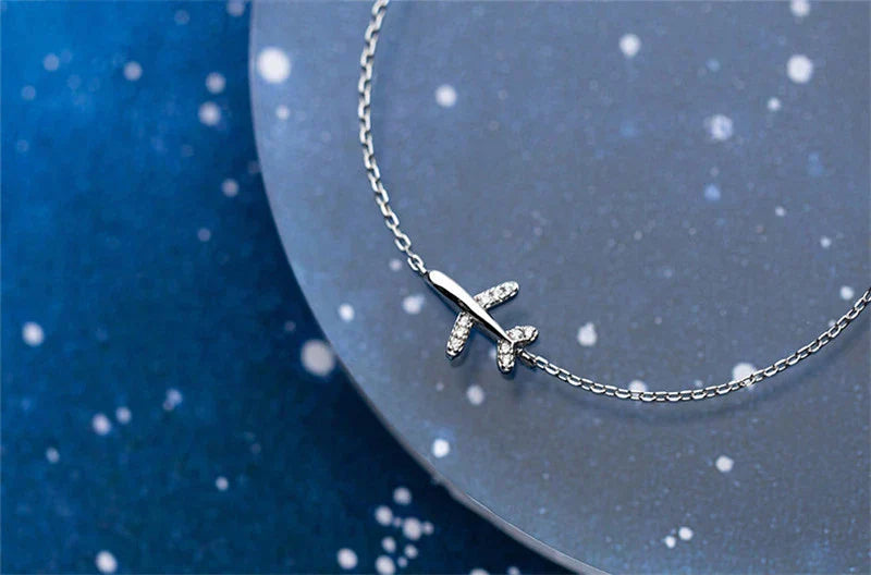 Bracelet en argent en forme d'avion
