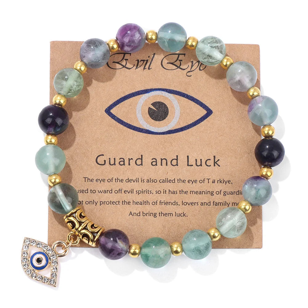 Bracelet en perles avec pendentif œil turc porte-bonheur