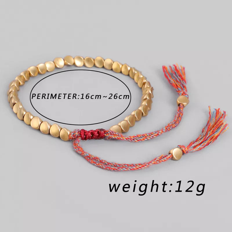 Bracelet en perles de cuivre porte-bonheur