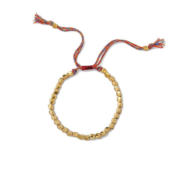 Bracelet en perles de cuivre porte-bonheur