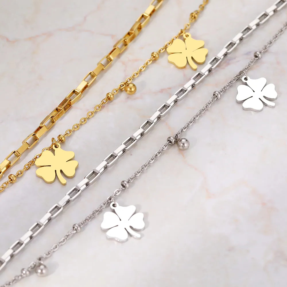 Bracelet en or avec trèfle à quatre feuilles