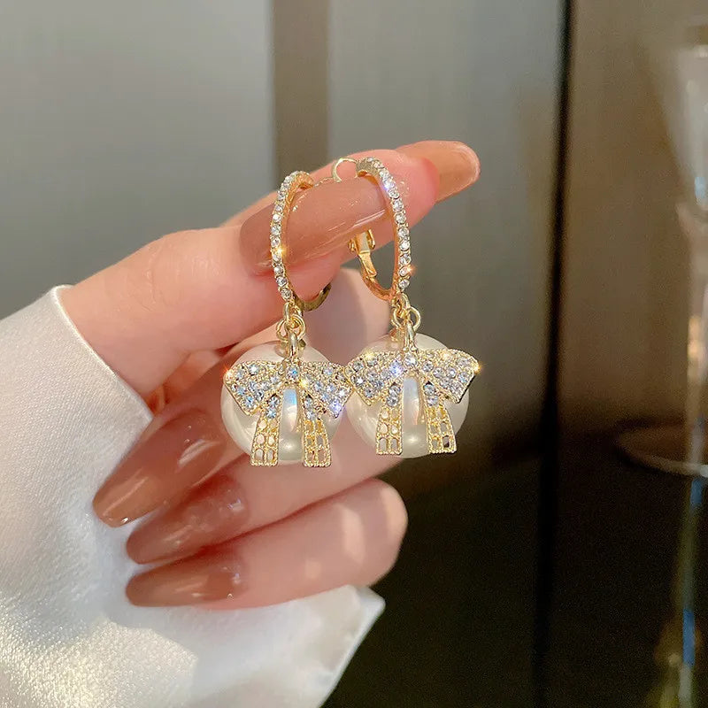 Boucles d'oreilles en perles et en nœuds de Noël