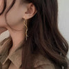 Boucles d'oreilles en forme de vagues