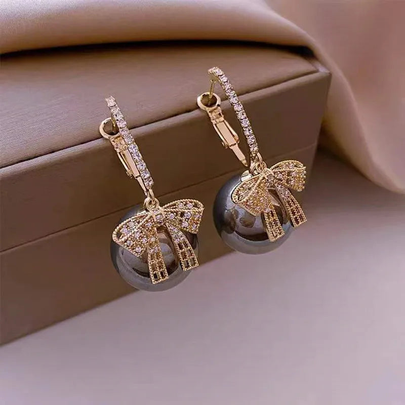 Boucles d'oreilles en perles et en nœuds de Noël