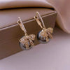 Boucles d'oreilles en perles et en nœuds de Noël