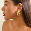 Boucles d'oreilles gouttes dorées