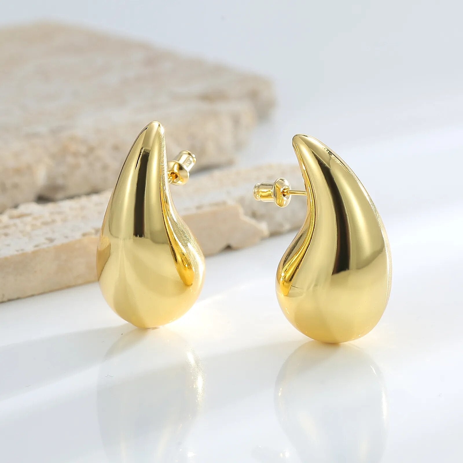 Boucles d'oreilles gouttes dorées