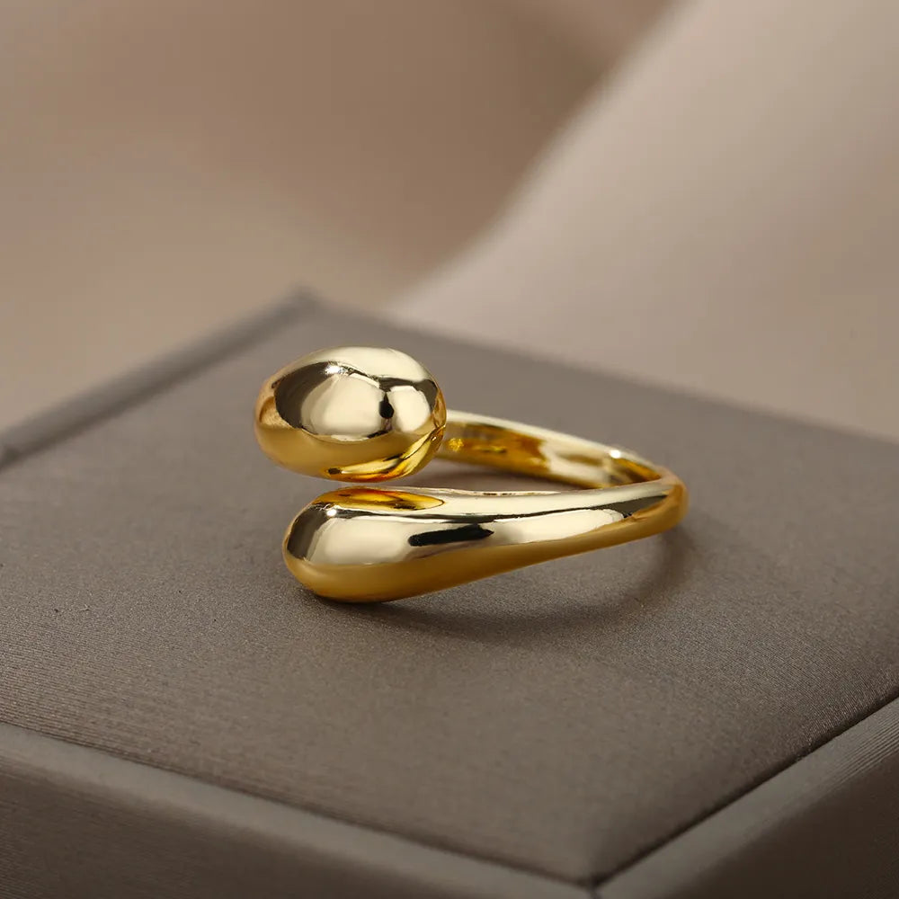 Bague ouverte avec perles dorées doubles