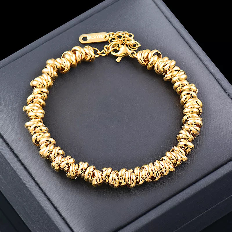 Bracelet chaîne perles dorées