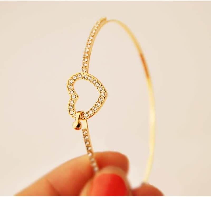 Bracelet d'amour doré avec charme