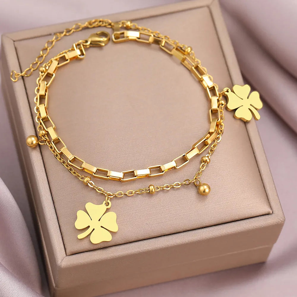 Bracelet en or avec trèfle à quatre feuilles