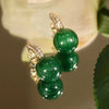 Boucles d'oreilles de luxe élégantes avec perles vertes
