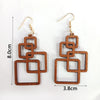 Boucles d'oreilles en bois en forme de goutte carrée