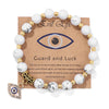 Bracelet en perles avec pendentif œil turc porte-bonheur