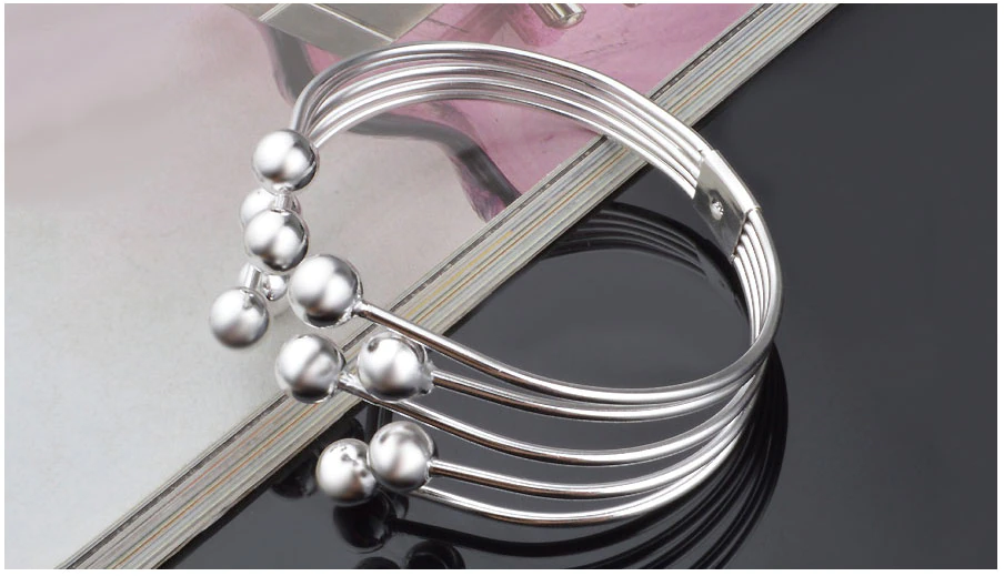 Bracelet ouvert large avec perles en argent