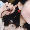 Superbes boucles d'oreilles cerises rouges