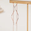 Boucles d'oreilles en forme de vagues