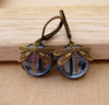Boucles d'oreilles en goutte de pierre de lune libellule