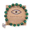 Bracelet en perles avec pendentif œil turc porte-bonheur
